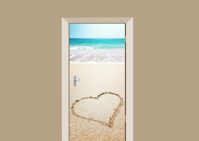 deursticker natuur hartje in het zand